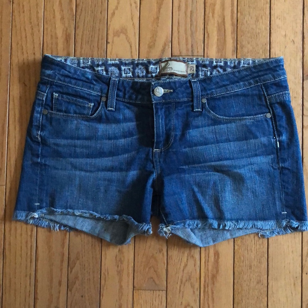 Paige Jean shorts with frayed bottom.